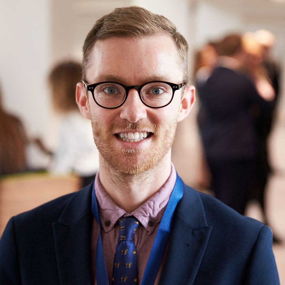 portrait-of-male-delegate-during-break-at-conferen-PD9PWZF.jpg